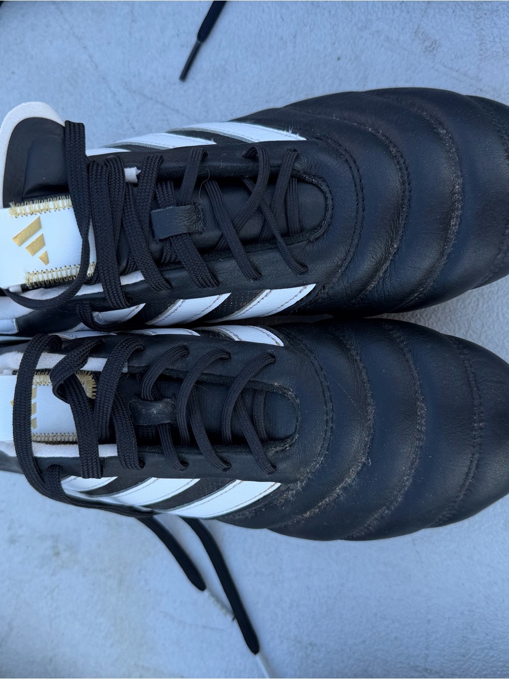 adidas Men’s Black & White Soccer/Football Cleats with Gold Logo